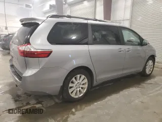 2017 Toyota Sienna XLE with VIN 5TDDZ3DC4HS166141, listed as a Copart auction lot 64357715 with 124,184 mi miles and Salvage title. Bid and sale history available at DreamBid. Image 3.