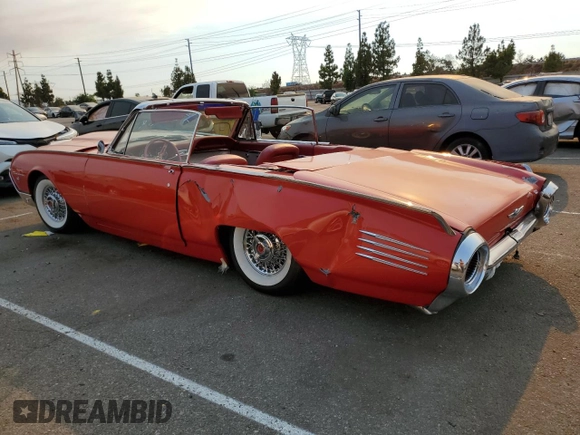 1961 Ford Thunderbird with VIN 1Y73Z116153, listed as a Copart auction lot 70746614 with 83,218 mi miles and Salvage Title. Bid and sale history available at DreamBid. Image 2.