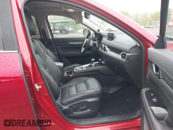 2020 Mazda CX-5 Grand Touring with VIN JM3KFBDM7L1731837, listed as a IAAI auction lot 42160795 with 63,826 mi miles and . Bid and sale history available at DreamBid. Image 5.
