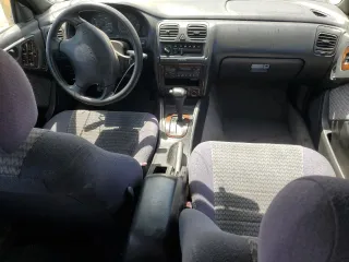 1998 Subaru Legacy Outback with VIN 4S3BG6857W7656879, listed as a Copart auction lot 53478125 with 272,771 mi miles and Salvage title. Bid and sale history available at DreamBid. Image 8.