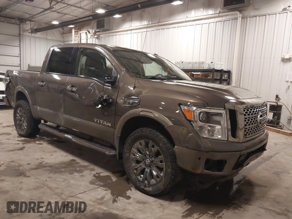 2017 Nissan Titan SV z VIN 1N6AA1E58HN523578, wystawiony jako IAAI lot #42160359 z przebiegiem 101 499 mil mil oraz . Historia ofert i sprzedaży dostępna na DreamBid. Obrazek 1.