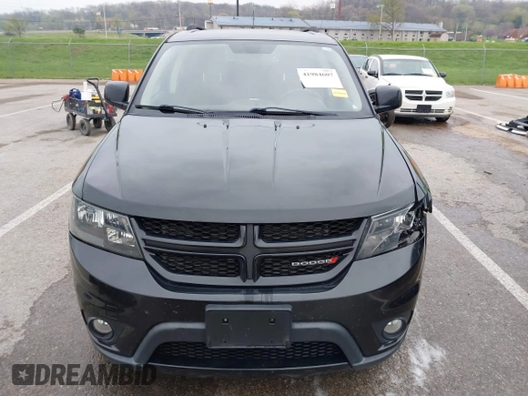 2013 Dodge Journey SXT with VIN 3C4PDDBG4DT660474, listed as a IAAI auction lot 41984607 with 124,926 mi miles and . Bid and sale history available at DreamBid. Image 13.
