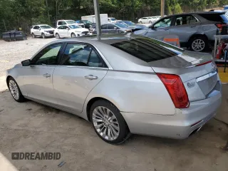 2014 Cadillac CTS Performance RWD with VIN 1G6AS5SX5E0140562, listed as a Copart auction lot 64336615 with 86,564 mi miles and Salvage title. Bid and sale history available at DreamBid. Image 2.
