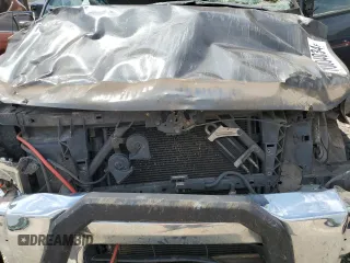 2012 Nissan Titan S z VIN 1N6AA0CJ9CN325160, wystawiony jako Copart lot #70004034 z przebiegiem 167 159 mil mil oraz Szkoda całkowita • Salvage title. Historia ofert i sprzedaży dostępna na DreamBid. Obrazek 11.