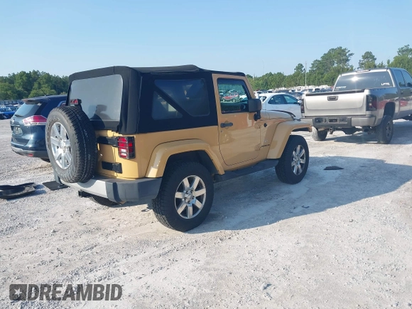 2013 Jeep Wrangler Arctic z VIN 1C4GJWBG2DL634942, wystawiony jako IAAI lot #42373239 z przebiegiem 131 470 mil mil oraz . Historia ofert i sprzedaży dostępna na DreamBid. Obrazek 4.
