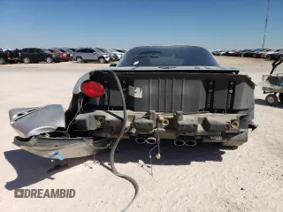 2004 Chevrolet Corvette with VIN 1G1YY22G945102769, listed as a Copart auction lot 74500664 with 64,718 mi miles and Salvage Title. Bid and sale history available at carsss.com. Image 6.