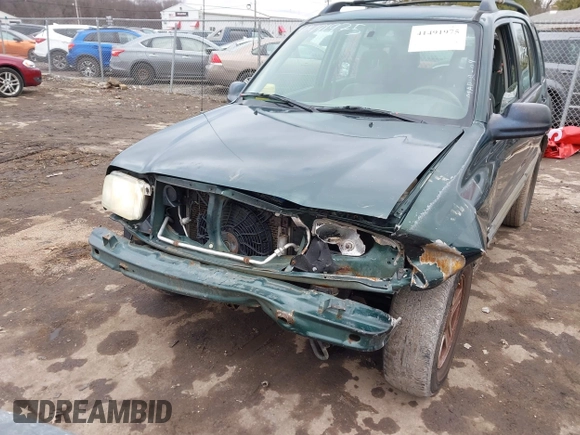 2002 Chevrolet Tracker z VIN 2CNBJ13C126946857, wystawiony jako IAAI lot #41491975 z przebiegiem Nie podano mil oraz . Historia ofert i sprzedaży dostępna na DreamBid. Obrazek 6.