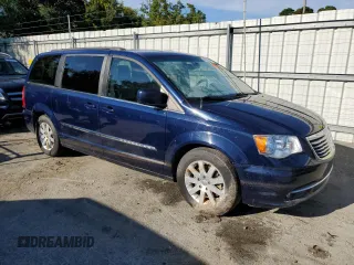 2014 Chrysler Town & Country Touring with VIN 2C4RC1BG2ER256457, listed as a Copart auction lot 70687244 with 179,893 mi miles and Salvage Title. Bid and sale history available at DreamBid. Image 4.