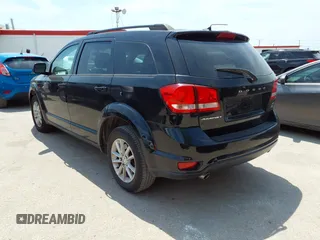 2015 Dodge Journey SXT with VIN 3C4PDCBG2FT718451, listed as a IAAI auction lot 42039821 with 198,695 mi miles and . Bid and sale history available at DreamBid. Image 3.