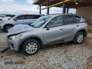 2014 Mazda CX-5 Touring z VIN JM3KE2CY4E0389019, wystawiony jako Copart lot #55749245 z przebiegiem 137 469 mil mil oraz Szkoda całkowita • Salvage title. Historia ofert i sprzedaży dostępna na DreamBid. Obrazek 1.