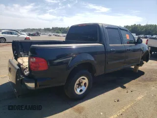 2001 Ford F-150 XLT with VIN 1FTRW07L81KE00951, listed as a Copart auction lot 57348535 with Not provided miles and Salvage title. Bid and sale history available at DreamBid. Image 3.