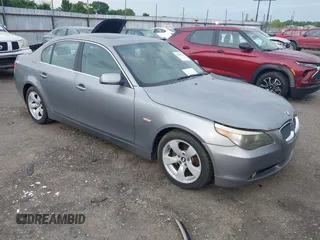 2005 BMW 5 Series 525i with VIN WBANA53535B857896, listed as a IAAI auction lot 42164290 with 207,711 mi miles. Bid and sale history available at carsss.com. Image 1.