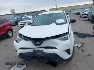 2017 Toyota RAV4 LE with VIN JTMZFREV1HJ103223, listed as a IAAI auction lot 41571466 with 96,860 mi miles and . Bid and sale history available at carsss.com. Image 12.