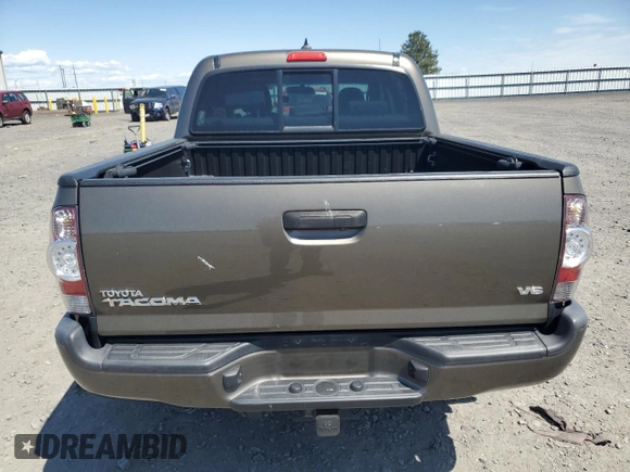 2014 Toyota Tacoma with VIN 3TMLU4EN7EM141763, listed as a Copart auction lot 59393505 with 50,177 mi miles and Salvage title. Bid and sale history available at DreamBid. Image 6.