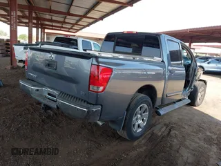 2013 Nissan Titan SL with VIN 1N6AA0ED0DN311415, listed as a IAAI auction lot 42697441 with 150,159 mi miles and . Bid and sale history available at DreamBid. Image 4.