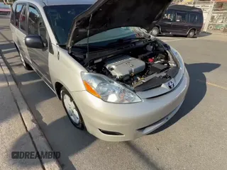 2010 Toyota Sienna CE with VIN 5TDKK4CC0AS327268, listed as a Copart auction lot 71871805 with 157,213 mi miles and Clean title. Bid and sale history available at DreamBid. Image 11.