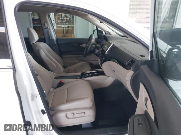 2020 Honda Ridgeline RTL-E with VIN 5FPYK3F71LB005028, listed as a IAAI auction lot 42167883 with 81,882 mi miles and . Bid and sale history available at DreamBid. Image 5.