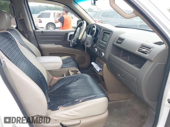 2008 Honda Ridgeline RT z VIN 2HJYK162X8H540132, wystawiony jako IAAI lot #42796783 z przebiegiem 226 779 mil mil oraz . Historia ofert i sprzedaży dostępna na DreamBid. Obrazek 5.