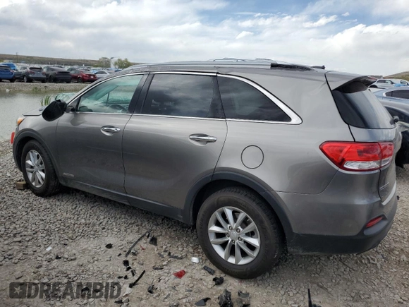 2016 Kia Sorento LX z VIN 5XYPGDA51GG134435, wystawiony jako Copart lot #54789715 z przebiegiem 122 743 mil mil oraz Szkoda całkowita • Salvage title. Historia ofert i sprzedaży dostępna na DreamBid. Obrazek 2.