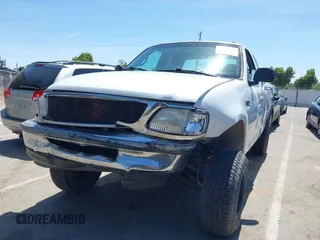 1997 Ford F-150 with VIN 1FTDX1766VNB41629, listed as a IAAI auction lot 42272858 with 202,367 mi miles and . Bid and sale history available at DreamBid. Image 2.