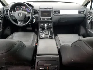 2015 Volkswagen Touareg Lux с VIN WVGEP9BP2FD002247, выставлен на аукционе Copart как лот 41924615 с пробегом 127 543 миль миль и Списание • Salvage title. История ставок и продаж доступна на DreamBid. Изображение 8.