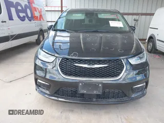 2023 Chrysler Pacifica Touring L with VIN 2C4RC1BG1PR550628, listed as a IAAI auction lot 42553430 with 61,773 mi miles and . Bid and sale history available at DreamBid. Image 13.