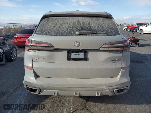2025 BMW X5 sDrive40i with VIN 5UX13EU09S9X71671, listed as a Copart auction lot 42515055 with 2,695 mi miles and Salvage Title. Bid and sale history available at carsss.com. Image 6.