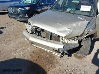 2002 Nissan Pathfinder LE with VIN JN8DR09Y82W713507, listed as a IAAI auction lot 41253781 with 302,501 mi miles. Bid and sale history available at carsss.com. Image 6.
