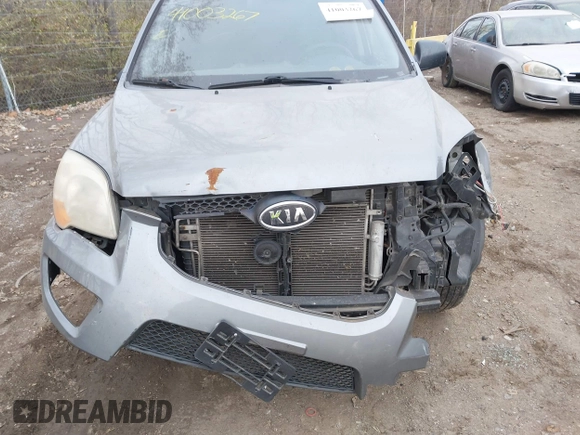 2009 Kia Sportage LX with VIN KNDJF724997570871, listed as a IAAI auction lot 41003267 with 231,654 mi miles and . Bid and sale history available at carsss.com. Image 6.