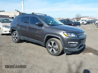 2017 Jeep Compass Latitude with VIN 3C4NJDBB9HT667415, listed as a IAAI auction lot 40755033 with 106,943 mi miles and . Bid and sale history available at DreamBid. Image 1.