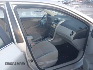 2013 Toyota Corolla L with VIN 5YFBU4EE1DP175281, listed as a IAAI auction lot 41395504 with 180,017 mi miles. Bid and sale history available at carsss.com. Image 5.