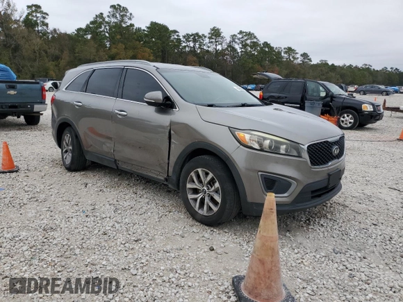 2016 Kia Sorento L with VIN 5XYPG4A34GG027362, listed as a Copart auction lot 84928684 with 154,502 mi miles and Salvage Title. Bid and sale history available at DreamBid. Image 4.