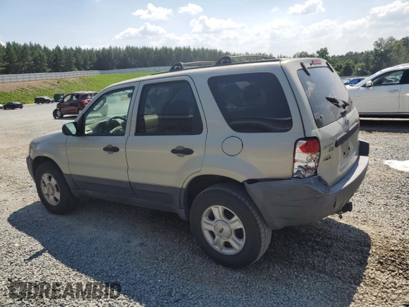 2004 Ford Escape XLT with VIN 1FMCU03134KB53192, listed as a Copart auction lot 62178075 with 223,637 mi miles and Salvage title. Bid and sale history available at DreamBid. Image 2.