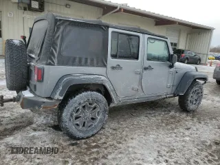 2015 Jeep Wrangler Unlimited Willys Wheeler with VIN 1C4BJWDG9FL516493, listed as a Copart auction lot 45098345 with 152,009 mi miles and Salvage Title. Bid and sale history available at DreamBid. Image 3.