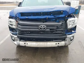 2014 Toyota Tundra 4WD Truck SR5 with VIN 5TFDY5F19EX412813, listed as a IAAI auction lot 41652585 with 164,091 mi miles. Bid and sale history available at carsss.com. Image 6.