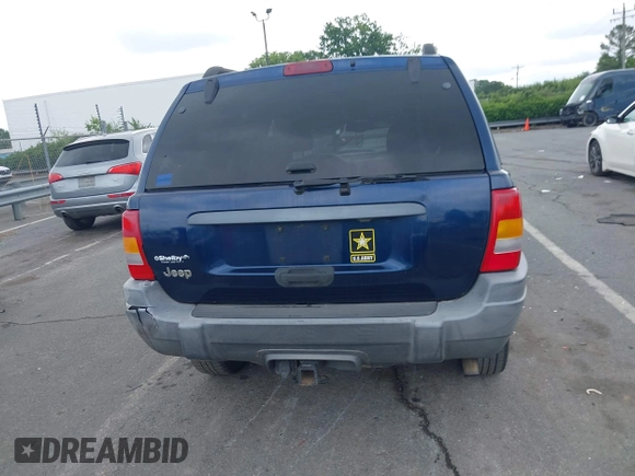 2002 Jeep Grand Cherokee Laredo with VIN 1J4GX48S02C125258, listed as a IAAI auction lot 42388724 with 295,270 mi miles and . Bid and sale history available at DreamBid. Image 16.
