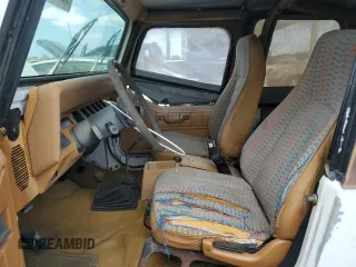 1995 Jeep Wrangler S z VIN 1J4FY19PXSP283293, wystawiony jako Copart lot #55553965 z przebiegiem 178 576 mil mil oraz Czysty tytuł • Clean title. Historia ofert i sprzedaży dostępna na DreamBid. Obrazek 7.
