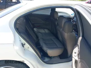 2003 Pontiac Bonneville SLE z VIN 1G2HY52K134202421, wystawiony jako IAAI lot #42136163 z przebiegiem Nie podano mil oraz . Historia ofert i sprzedaży dostępna na DreamBid. Obrazek 8.