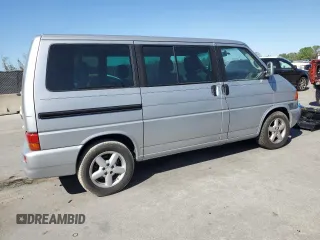 2002 Volkswagen EuroVan с VIN WV2KB47012H065431, выставлен на аукционе Copart как лот 49010445 с пробегом 78 985 миль миль и Чистый • Clean title. История ставок и продаж доступна на DreamBid. Изображение 3.