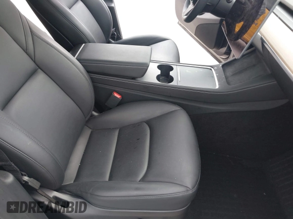 2024 Tesla Model Y with VIN 7SAYGDED3RF002246, listed as a IAAI auction lot 41566184 with 10,316 mi miles and . Bid and sale history available at DreamBid. Image 5.