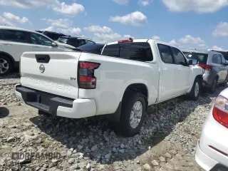 2024 Nissan Frontier SV with VIN 1N6ED1FJ1RN659511, listed as a Copart auction lot 57138225 with 21,933 mi miles and Salvage title. Bid and sale history available at DreamBid. Image 3.