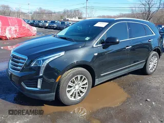 2019 Cadillac XT5 Luxury AWD with VIN 1GYKNDRS0KZ219247, listed as a IAAI auction lot 41870568 with 58,734 mi miles and . Bid and sale history available at carsss.com. Image 2.