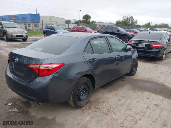 2019 Toyota Corolla L with VIN 5YFBURHE6KP937767, listed as a IAAI auction lot 41637686 with 115,998 mi miles. Bid and sale history available at carsss.com. Image 4.