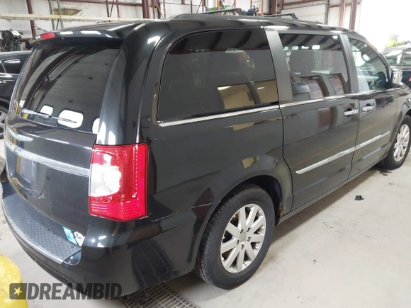 2012 Chrysler Town & Country Touring L with VIN 2C4RC1CGXCR170910, listed as a IAAI auction lot 41911179 with 167,850 mi miles and . Bid and sale history available at carsss.com. Image 4.