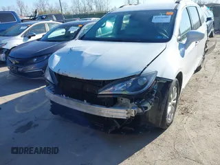 2017 Chrysler Pacifica Touring L with VIN 2C4RC1BG8HR677720, listed as a IAAI auction lot 41976606 with 170,175 mi miles and . Bid and sale history available at DreamBid. Image 6.