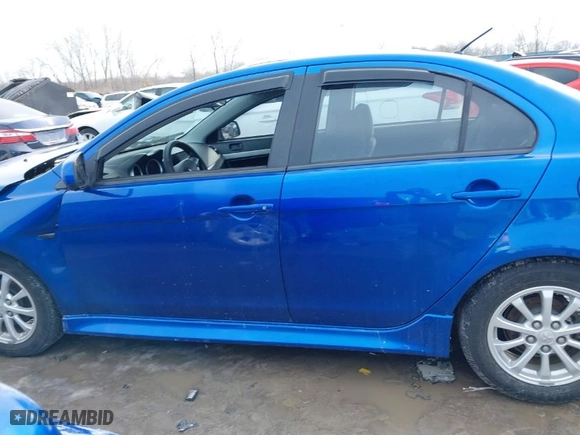 2012 Mitsubishi Lancer SE with VIN JA32V2FWXCU016364, listed as a IAAI auction lot 41619504 with 139,260 mi miles. Bid and sale history available at carsss.com. Image 15.