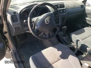 2002 Nissan Frontier SE with VIN 1N6ED27T52C383700, listed as a Copart auction lot 86204074 with 216,908 mi miles and Salvage title. Bid and sale history available at DreamBid. Image 8.