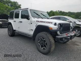 2023 Jeep Wrangler Rubicon with VIN 1C4JJXFM3PW585720, listed as a Copart auction lot 59776305 with 19,190 mi miles and Salvage title. Bid and sale history available at DreamBid. Image 4.
