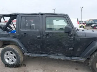 2008 Jeep Wrangler Unlimited X with VIN 1J8GA39148L577903, listed as a IAAI auction lot 41564957 with 95,359 mi miles. Bid and sale history available at carsss.com. Image 13.