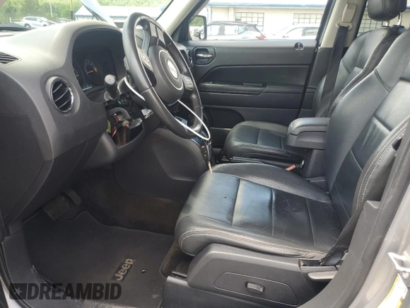 2016 Jeep Patriot High Altitude with VIN 1C4NJRFB8GD580603, listed as a Copart auction lot 63304965 with 89,177 mi miles and Salvage title. Bid and sale history available at DreamBid. Image 7.